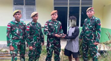 *Satgas Pamtas RI-Malaysia Yonarmed 19/Bogani Terima Penyerahan Sisik Trenggiling dari Warga, Wujud Keberhasilan Pembinaan di Perbatasan*