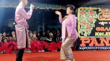 Kolaborasi Seni Tradisional dan Modern Pukau Warga Polatebu Kecamatan Kutabuluh di Acara Kerja Tahun