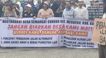 Aksi Damai Warga Semangat Gunung, Kami Bukan Pungli
